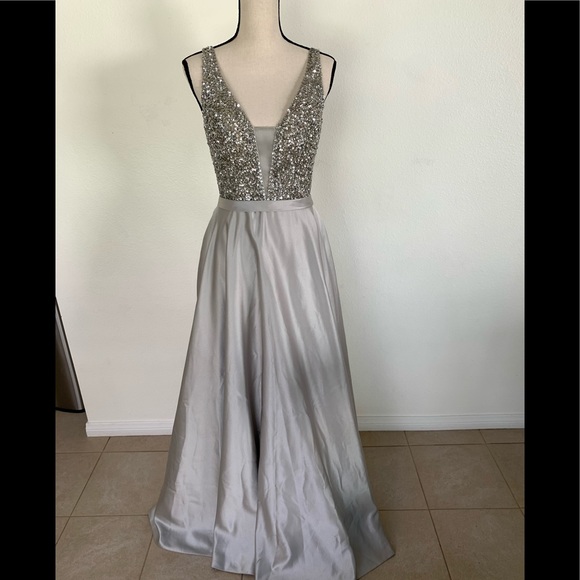 Silver Beaded plunging neckline princess ball gown